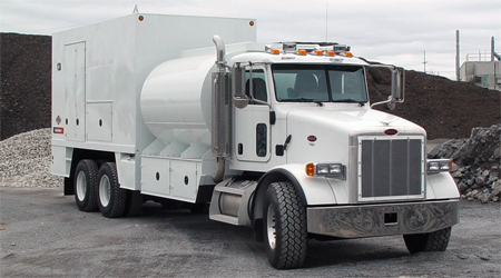 enclosed lube truck with fuel on Peterbilt chassis tandem axle.  IMT equipment, eliptical diesel fuel tank.